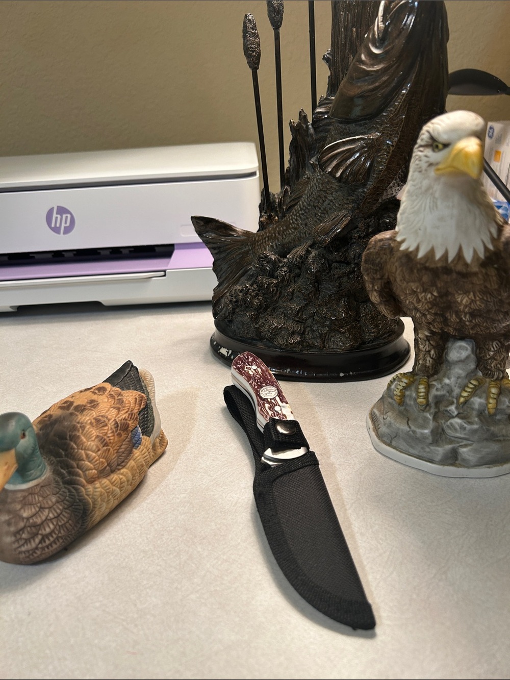 Fixed-Blade Outdoor Knife with Maroon Pattern Handle and Black Sheath